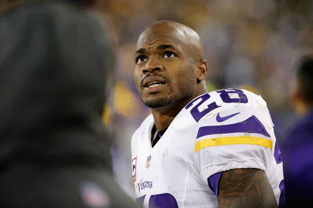 GREEN BAY, WI - JANUARY 03:  Adrian Peterson #28 of the Minnesota Vikings looks on during the second half against the Green Bay Packers at Lambeau Field on January 3, 2016 in Green Bay, Wisconsin.  (Photo by Jon Durr/Getty Images)