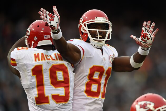 OAKLAND, CA - DECEMBER 06:  Jeremy Maclin #19 of the Kansas City Chiefs celebrates with Jason Avant #81 after a 1-yard touchdown pass from Alex Smith #11 during their NFL game against the Oakland Raiders at O.co Coliseum on December 6, 2015 in Oakland, California.  (Photo by Thearon W. Henderson/Getty Images)