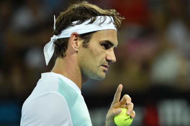 Roger Federer of Switzerland gets ready to serve against Tobias Kamke of Germany during their men's singles match on the fifth day of the Brisbane International tennis tournament on January 7, 2016. AFP PHOTO / Saeed KHAN
-- IMAGE RESTRICTED TO EDITORIAL USE - STRICTLY NO COMMERCIAL USE / AFP / SAEED KHAN        (Photo credit should read SAEED KHAN/AFP/Getty Images)