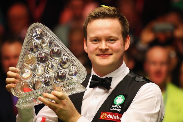 LONDON, ENGLAND - JANUARY 18:  Shaun Murphy of Great Britain lifts the trophy after winning the final of the Dafabet Masters at Alexandra Palace on January 18, 2015 in London, England.  (Photo by Bryn Lennon/Getty Images)