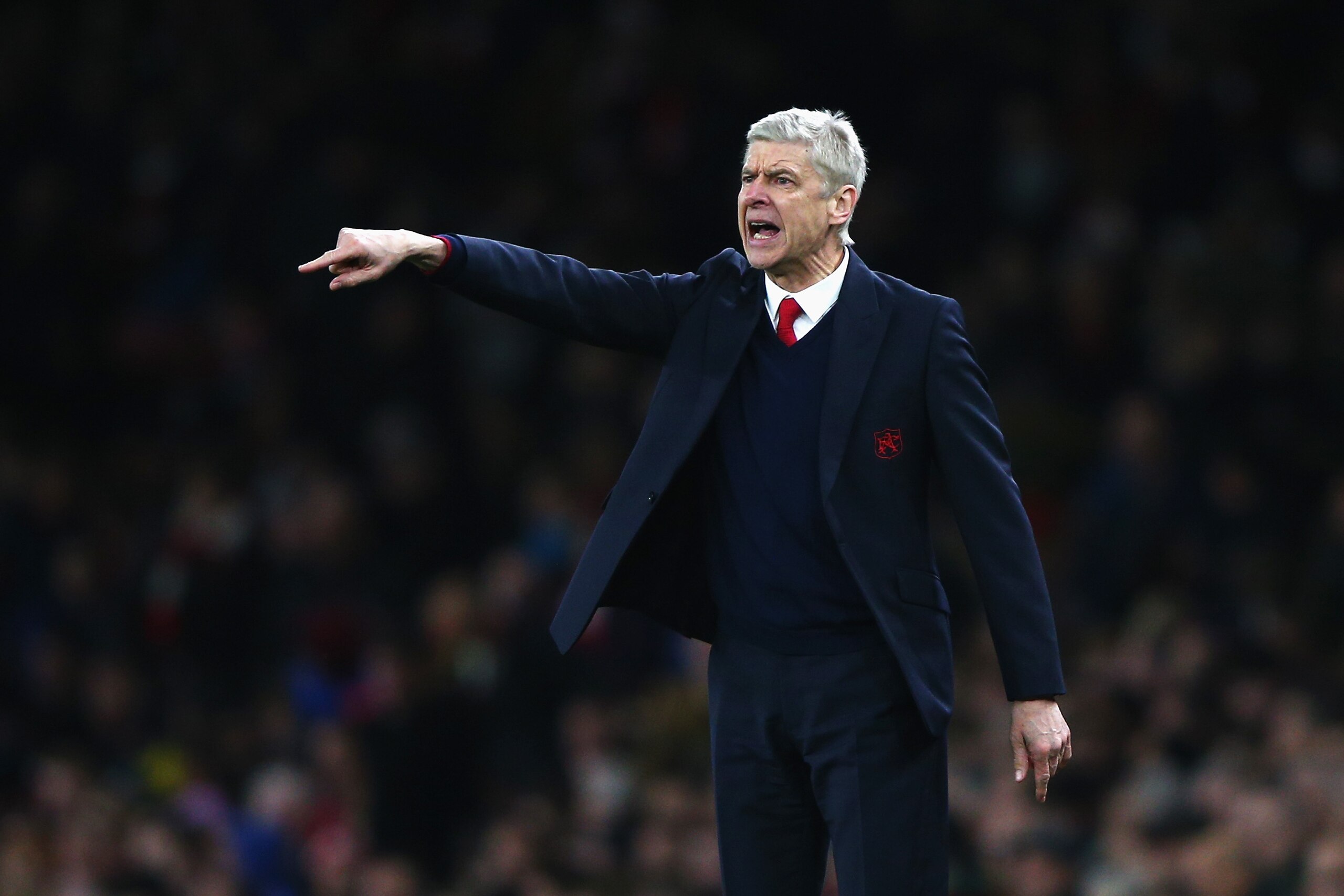 LONDON, ENGLAND - DECEMBER 28: Arsene Wenger Manager of Arsenal gestures during the Barclays Premier League match between Arsenal and A.F.C. Bournemouth at Emirates Stadium on December 28, 2015 in London, England. (Photo by Ian Walton/Getty Images) LONDON, ENGLAND - DECEMBER 28: Arsene Wenger Manager of Arsenal gestures during the Barclays Premier League match between Arsenal and A.F.C. Bournemouth at Emirates Stadium on December 28, 2015 in London, England. (Photo by Ian Walton/Getty Images)