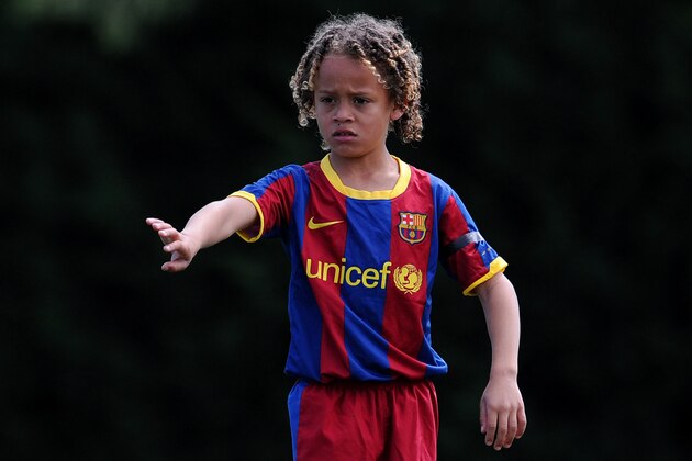 BARCELONA, SPAIN - MAY 15:  Eight-year-old Barcelona youth player Xavi Simons instructs his teammates during his match againts Llongueras on one of the pitches at the Joan Camper training ground on May 15, 2011 in Barcelona, Spain. Every weekend various teams of Barcelona youth players play in matches with the hope of one day making it to the top.  (Photo by Jasper Juinen/Getty Images)