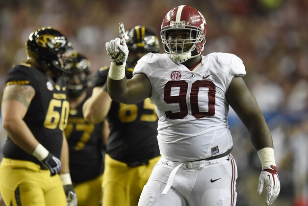 Dec 6, 2014; Atlanta, GA, USA; Alabama Crimson Tide defensive lineman Jarran Reed (90) reacts during the second quarter of the 2014 SEC Championship Game against the Missouri Tigers  at the Georgia Dome. Mandatory Credit: Dale Zanine-USA TODAY Sports