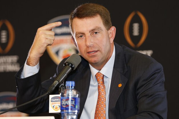 Clemson head coach Dabo Swinney speaks during the coaches press conference Wednesday, Dec. 30, 2015, in Fort Lauderdale, Fla. Clemson is scheduled to play Oklahoma in the Orange Bowl NCAA college football game on New Year's Eve. Swinney spoke about three of his players who will not play for the rest of the season, saying it was for “violation of team rules.” (AP Photo/Joe Skipper)
