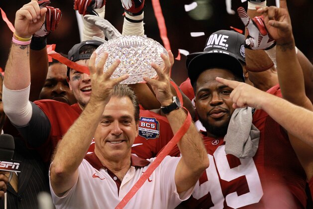 NEW ORLEANS, LA - JANUARY 09:  Head coach Nick Saban of the Alabama Crimson Tide celebrates with the trophy after defeating Louisiana State University Tigers in the 2012 Allstate BCS National Championship Game at Mercedes-Benz Superdome on January 9, 2012 in New Orleans, Louisiana.  (Photo by Ronald Martinez/Getty Images)