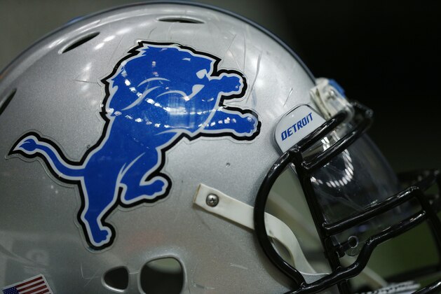 A Detroit Lions helmet sits on the field before an NFL football game against the New Orleans Saints in New Orleans, Monday, Dec. 21, 2015. (AP Photo/Brynn Anderson)