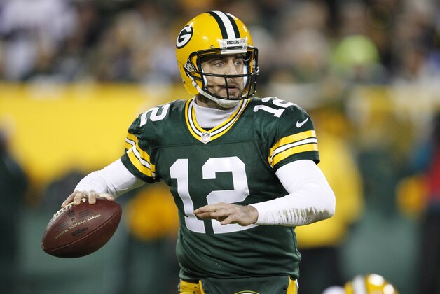 Green Bay Packers' Aaron Rodgers drops back during the first half an NFL football game against the Minnesota Vikings Sunday, Jan. 3, 2016, in Green Bay, Wis. (AP Photo/Matt Ludtke)