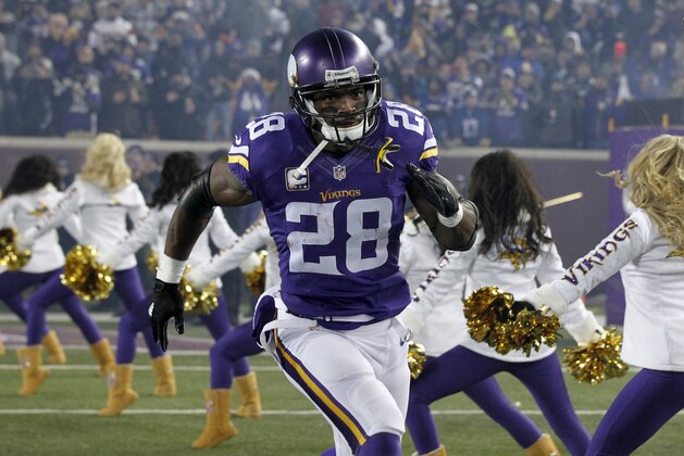 Minnesota Vikings running back Adrian Peterson (28) runs on the field before an NFL football game against the New York Giants, Sunday, Dec. 27, 2015, in Minneapolis. (AP Photo/Andy Clayton-King)