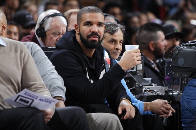 SACRAMENTO, CA - DECEMBER 15: Canadian rapper Drake and owner Vivek Ranadive of the Sacramento Kings attends the game between the Houston Rockets and Sacramento Kings on December 15, 2015 at Sleep Train Arena in Sacramento, California. NOTE TO USER: User expressly acknowledges and agrees that, by downloading and or using this photograph, User is consenting to the terms and conditions of the Getty Images Agreement. Mandatory Copyright Notice: Copyright 2015 NBAE (Photo by Rocky Widner/NBAE via Getty Images)
