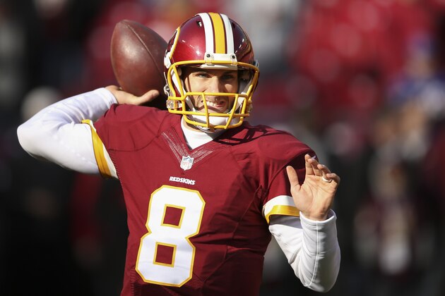 Kirk Cousins warms up before an NFL football game against the Buffalo Bills in Landover, Md., Sunday, Dec. 20, 2015. (AP Photo/Andrew Harnik)
