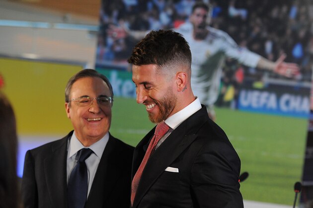 MADRID, SPAIN - AUGUST 17:  Sergio Ramos of Real Madrid smiles along with Real president Florentino Perez during a press conference to announce Ramos' new five-year contract with Real Madrid at the Santiago Bernabeu stadium on August 17, 2015 in Madrid, Spain.  (Photo by Denis Doyle/Getty Images)