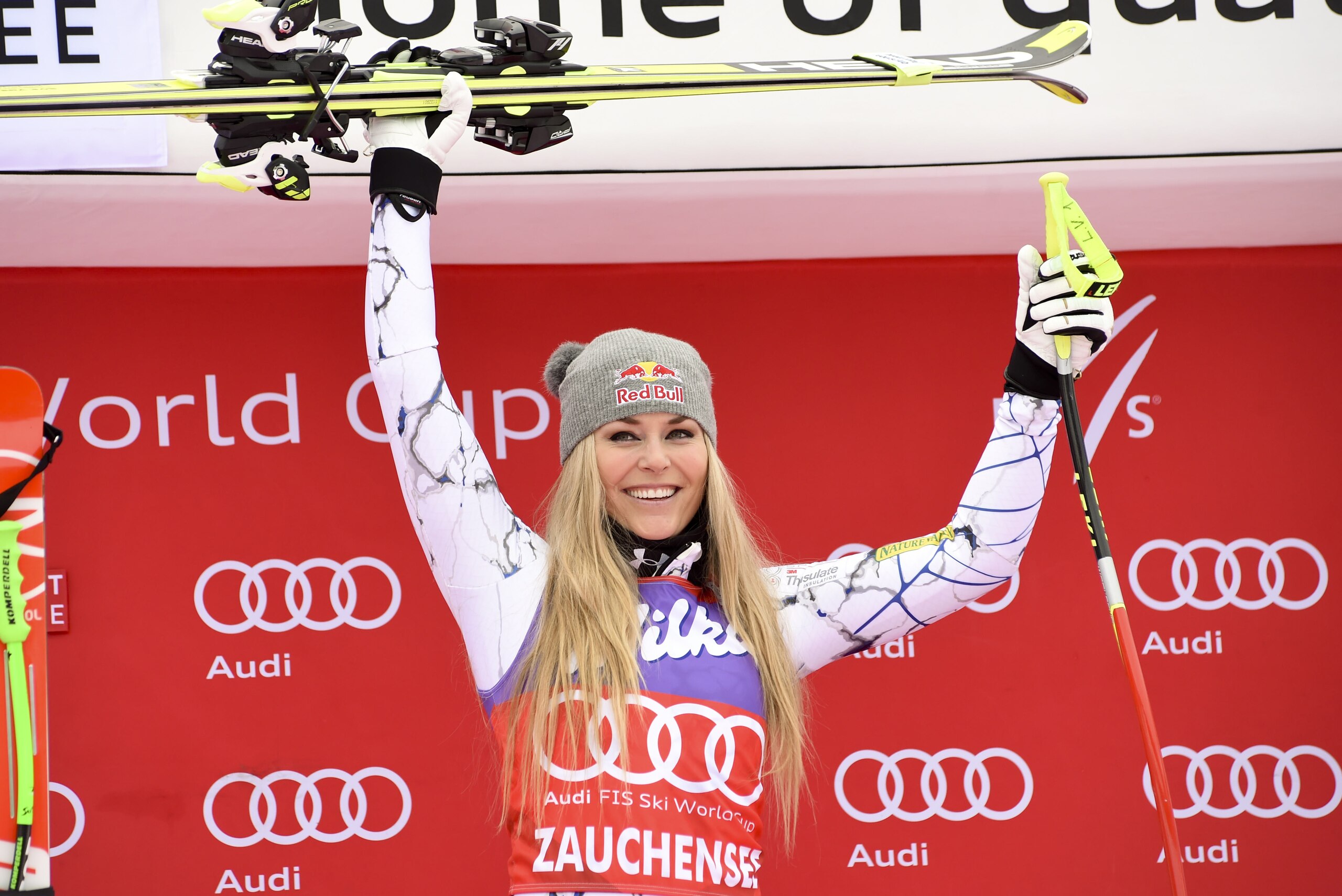 Lindsey Vonn, of the United States, celebrates on the podium after winning an alpine ski, women's World Cup downhill, in Altenmarkt-Zauchensee, Austria, Saturday, Jan 9, 2016. (AP Photo/Pier Marco Tacca)