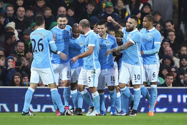 NORWICH, ENGLAND - JANUARY 09: Sergio Aguero (C) of Manchester City celebrates scoring his team's first goal with his team mates during the Emirates FA Cup third round match between Norwich City and Manchester City at Carrow Road on January 9, 2016 in Norwich, England.  (Photo by Michael Regan/Getty Images)