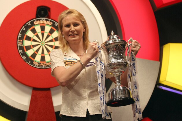 FRIMLEY, ENGLAND - JANUARY 07:  Trina Gulliver of England celebrates with the trophy after winning against Rhian Edwards of Wales in the Womens Final on January 7, 2011 in Frimley, England.  (Photo by Ian Walton/Getty Images)