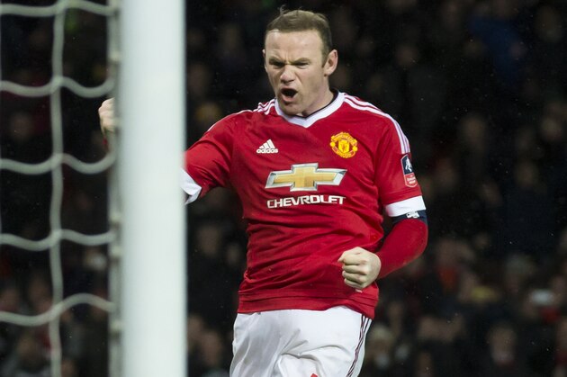 Manchester United's Wayne Rooney celebrates after scoring during the English FA Cup third round soccer match between Manchester United and Sheffield United at Old Trafford Stadium, Manchester, England, Saturday Jan. 9, 2016. (AP Photo/Jon Super)