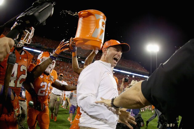 CLEMSON, SC - NOVEMBER 07:  Head coach Dabo Swinney of the Clemson Tigers celebrates with his team after defeating the Florida State Seminoles 23-13 at Memorial Stadium on November 7, 2015 in Clemson, South Carolina.  (Photo by Streeter Lecka/Getty Images)