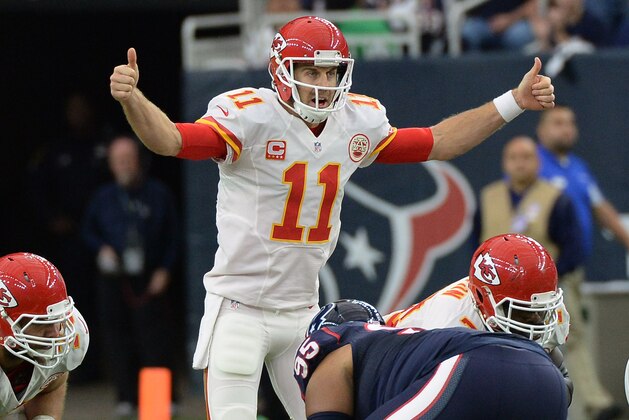 Kansas City Chiefs quarterback Alex Smith (11) calls a play during the first half of an NFL wild-card playoff football game against the Houston Texans, Saturday, Jan. 9, 2016, in Houston. (AP Photo/George Bridges)