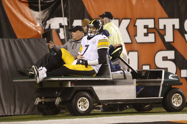 Pittsburgh Steelers' Ben Roethlisberger (7) is taken off the field after getting sacked by Cincinnati Bengals' Vontaze Burfict (55) during the second half of an NFL wild-card playoff football game Saturday, Jan. 9, 2016, in Cincinnati. (AP Photo/Gary Landers)