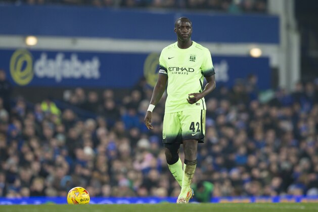Manchester City's Yaya Toure prepares to take a free kick during the English League Cup semi final first leg soccer match between Everton and Manchester City at Goodison Park Stadium, Liverpool, England, Wednesday Jan. 6, 2016. (AP Photo/Jon Super)