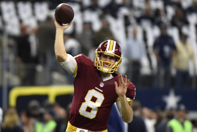 Washington Redskins quarterback Kirk Cousins throws a pass during warm ups before an NFL football game against the Dallas Cowboys on Sunday, Jan. 3, 2016, in Arlington , Texas. (AP Photo/Michael Ainsworth)