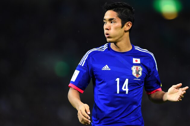 SAITAMA, JAPAN - SEPTEMBER 03:  Yoshinori Muto of Japan in action during the 2018 FIFA World Cup Qualifier Round 2 - Group E match between Japan and Cambodia at Saitama Stadium on September 3, 2015 in Saitama, Japan.  (Photo by Masterpress/Getty Images)