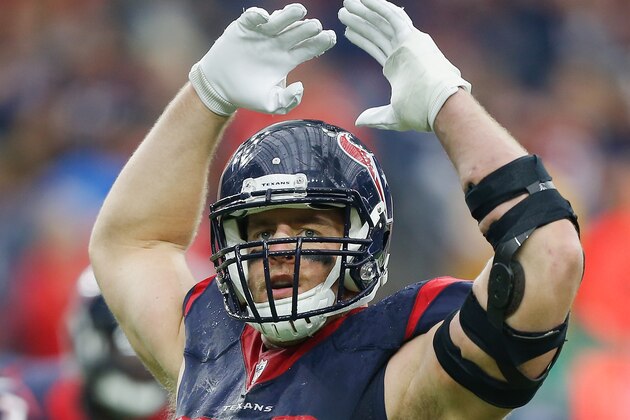 HOUSTON, TX - JANUARY 09:  J.J. Watt #99 of the Houston Texans attempts to hype up the crowd during the AFC Wild Card game at NRG Stadium on January 9, 2016 in Houston, Texas.  (Photo by Bob Levey/Getty Images)