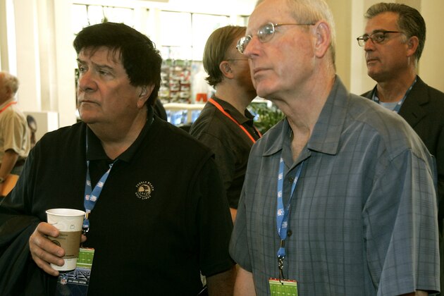 New York Giants general manger Ernie Accorsi, left, and head coach Tom Coughlin get ready for the morning session of the National Football League annual meeting in Orlando, Fla. on Wednesday, March 29, 2006.(AP Photo/John Raoux)