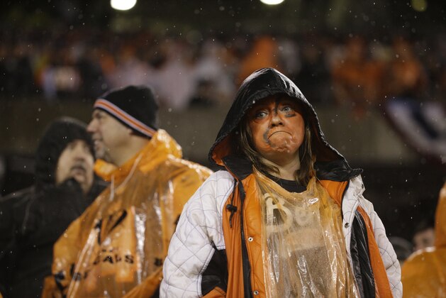 Cincinnati Bengals fans during the second half of an NFL wild-card playoff football game against the Pittsburgh Steelers Saturday, Jan. 9, 2016, in Cincinnati. (AP Photo/John Minchillo)