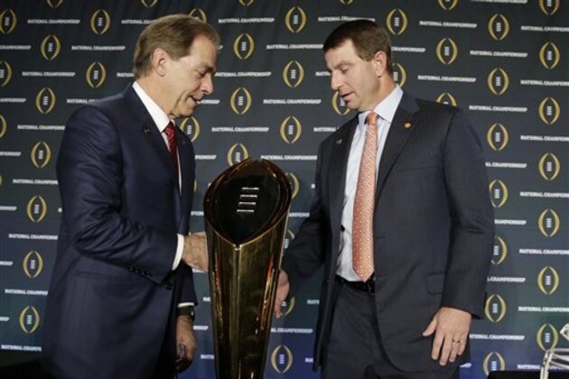 Clemson head coach Dabo Swinney and Alabama head coach Nick Saban shake hands after a news conference for the NCAA college football playoff championship game Sunday, Jan. 10, 2016, in Glendale, Ariz. (AP Photo/Chris Carlson)
