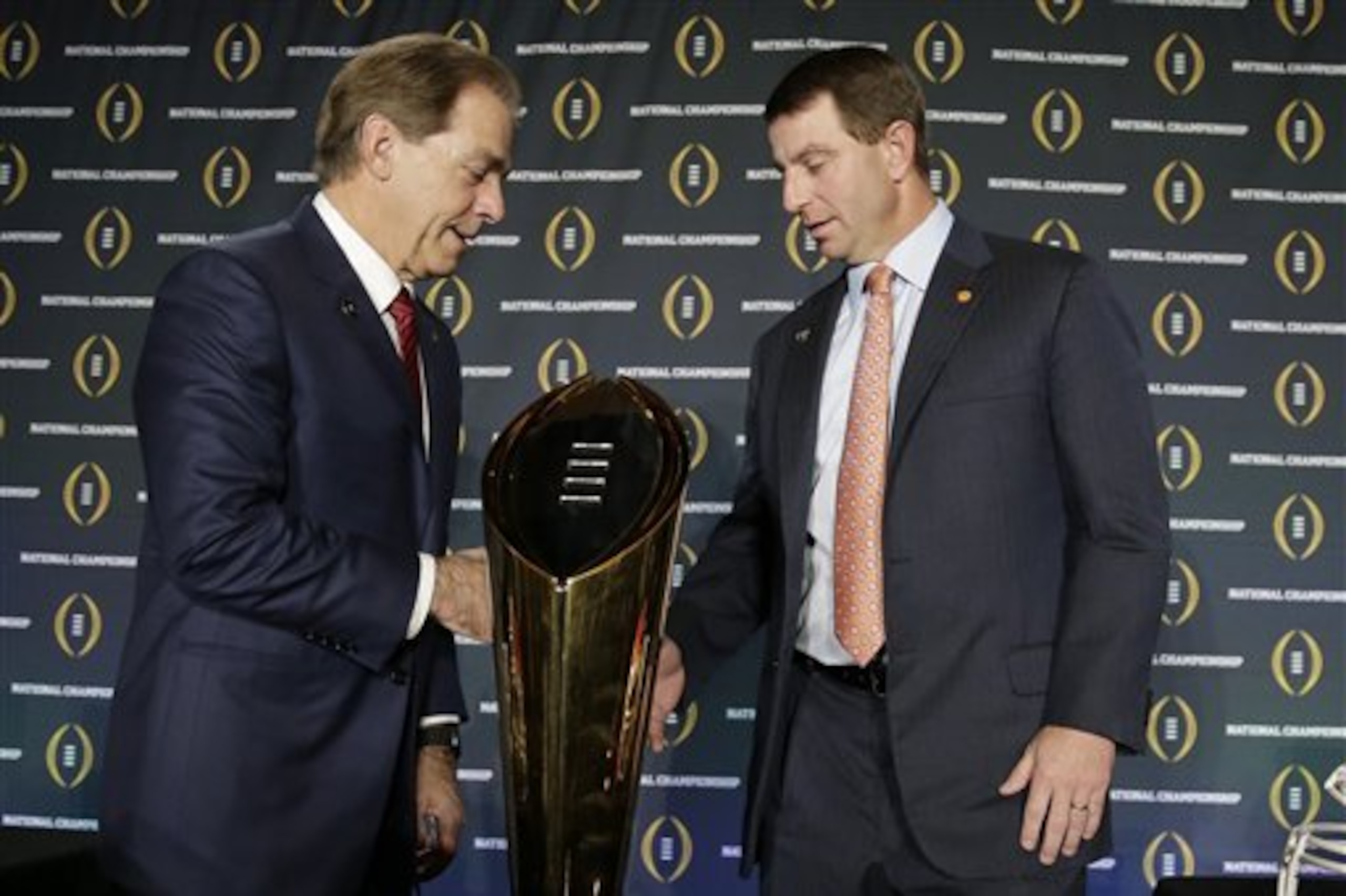 Clemson head coach Dabo Swinney and Alabama head coach Nick Saban shake hands after a news conference for the NCAA college football playoff championship game Sunday, Jan. 10, 2016, in Glendale, Ariz. (AP Photo/Chris Carlson) Clemson head coach Dabo Swinney and Alabama head coach Nick Saban shake hands after a news conference for the NCAA college football playoff championship game Sunday, Jan. 10, 2016, in Glendale, Ariz. (AP Photo/Chris Carlson)