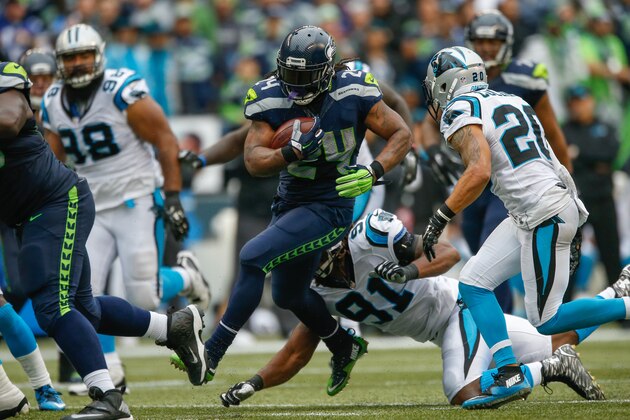 SEATTLE, WA - OCTOBER 18:  Running back Marshawn Lynch #24 of the Seattle Seahawks rushes against the Carolina Panthers at CenturyLink Field on October 18, 2015 in Seattle, Washington. The Panthers defeated the Seahawks 27-23.  (Photo by Otto Greule Jr/Getty Images)