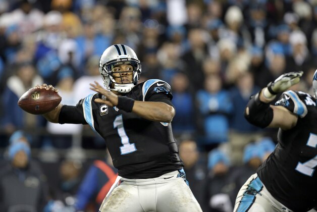 Carolina Panthers' Cam Newton (1) looks to pass against the Tampa Bay Buccaneers during the second half of an NFL football game in Charlotte, N.C., Sunday, Jan. 3, 2016. The Panthers won 38-10. (AP Photo/Bob Leverone)