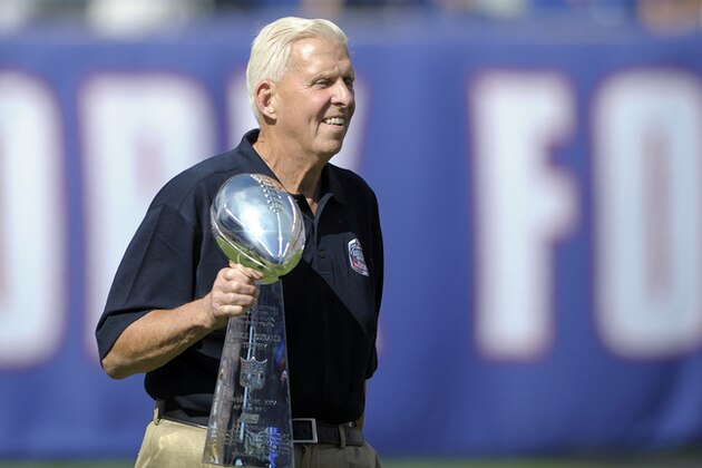 Former New York Giants head coach Bill Parcells walks with the Super Bowl XXV trophy during a 25 year anniversary celebration at halftime of an NFL football game against the Atlanta Falcons, Sunday, Sept. 20, 2015, in East Rutherford, N.J. (AP Photo/Bill Kostroun) Former New York Giants head coach Bill Parcells walks with the Super Bowl XXV trophy during a 25 year anniversary celebration at halftime of an NFL football game against the Atlanta Falcons, Sunday, Sept. 20, 2015, in East Rutherford, N.J. (AP Photo/Bill Kostroun)