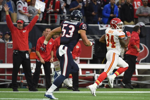 Kansas City Chiefs running back Knile Davis (34) runs for a touchdown as Houston Texans inside linebacker Max Bullough (53) chases him during the first half of an NFL football game Saturday, Jan. 9, 2016, in Houston. (AP Photo/Eric Christian Smith)
