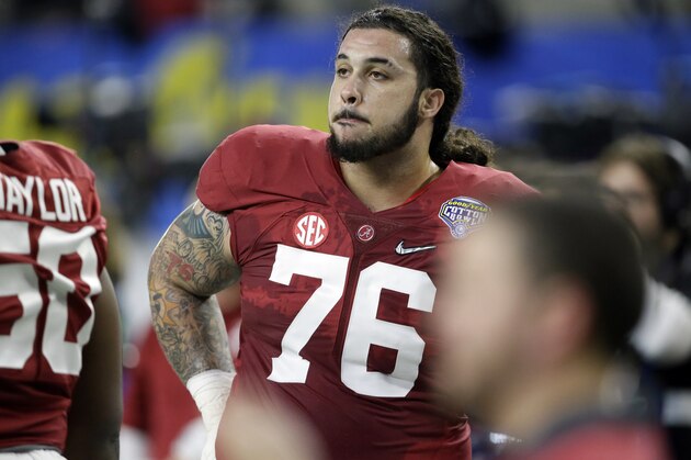 Alabama offensive lineman Dominick Jackson stands on the sideline before the Cotton Bowl NCAA college football semifinal playoff game against Michigan State, Thursday, Dec. 31, 2015, in Arlington, Texas. (AP Photo/LM Otero)