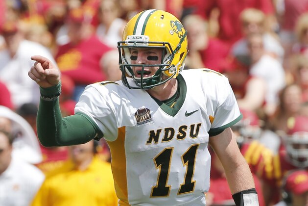 AMES, IA - AUGUST 30: Quarterback Carson Wentz #11 of the North Dakota State Bison calls a play in the second half of play against the Iowa State Cyclones at Jack Trice Stadium on August 30, 2014 in Ames, Iowa. North Dakota State defeated Iowa State 34-14. (Photo by David K Purdy/Getty Images)