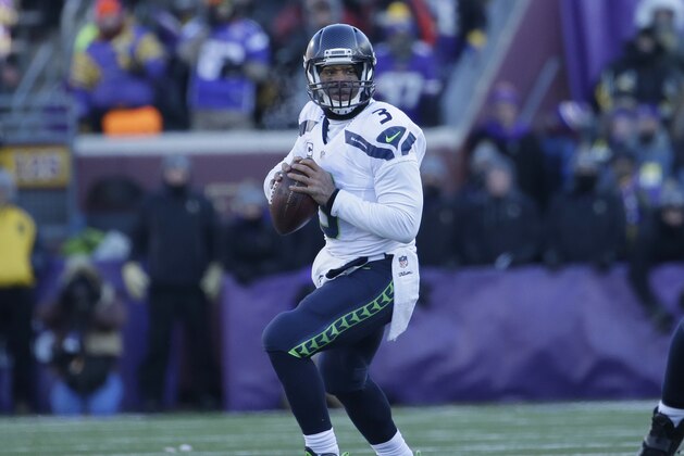 Seattle Seahawks quarterback Russell Wilson (3) scrambles during the first half of an NFL wild-card football game against the Minnesota Vikings, Sunday, Jan. 10, 2016, in Minneapolis. (AP Photo/Nam Y. Huh)