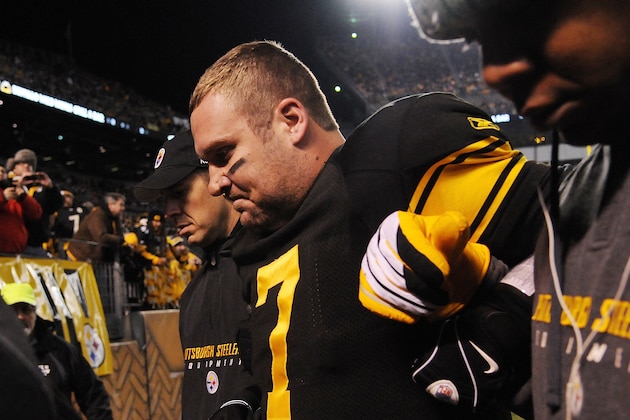 PITTSBURGH - DECEMBER 8:  Quarterback Ben Roethlisberger #7 of the Pittsburgh Steelers is helped off the field after he injured his left ankle when he was sacked by Scott Paxson of the Cleveland Browns during a game at Heinz Field on December 8, 2011 in Pittsburgh, Pennsylvania.  The Steelers defeated the Browns 14-3.  (Photo by George Gojkovich/Getty Images)