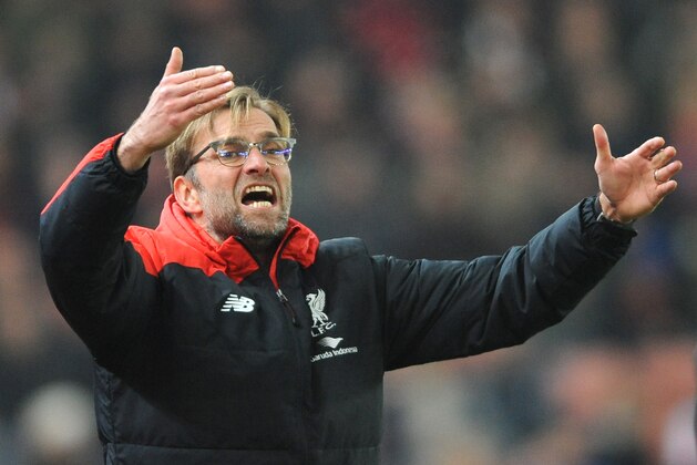 Liverpool manager Juergen Klopp gestures during the first leg of the English League Cup semifinal soccer match between Stoke City and Liverpool at the Britannia Stadium, Stoke on Trent, England, Tuesday, Jan. 5, 2016. (AP Photo/Rui Vieira)