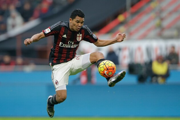 AC Milan's Carlos Bacca controls the ball a Serie A soccer match between AC Milan and Bologna, at the San Siro stadium in Milan, Italy, Wednesday Jan. 6, 2016. (AP Photo/Luca Bruno)