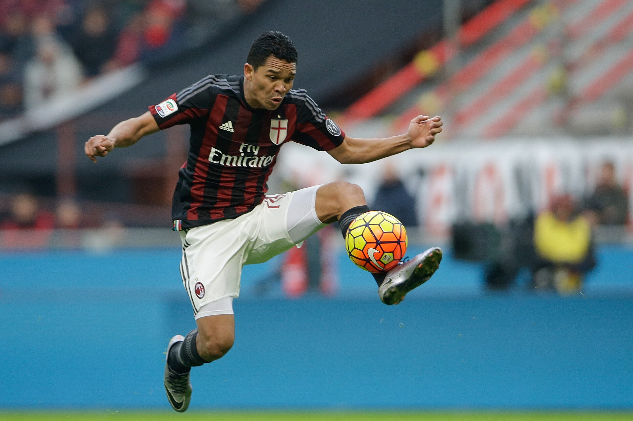 AC Milan's Carlos Bacca controls the ball a Serie A soccer match between AC Milan and Bologna, at the San Siro stadium in Milan, Italy, Wednesday Jan. 6, 2016. (AP Photo/Luca Bruno)