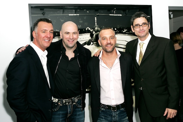 LONDON - JANUARY 17:  (UK TABLOID NEWSPAPERS OUT) (L-R) Brothers and co-owners of the Ultimate Fighting Championship Frank (L) and Lorenzo Fertitta (2nd R), UFC president Dana White (2nd L) and photographer Kevin Lynch attend the 'Octagon' private view at Hamilton's gallery on January 17, 2007 in London, England.  The exhibition showcases work by Lynch documenting the world of Ultimate Fighter Championship (UFC) events.  (Photo by Claire Greenway/Getty Images)