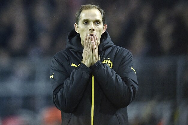 Dortmund head coach Thomas Tuchel reacts during the German Bundesliga soccer match between Borussia Dortmund and Eintracht Frankfurt in Dortmund, Germany, Sunday, Dec. 13, 2015. (AP Photo/Martin Meissner)