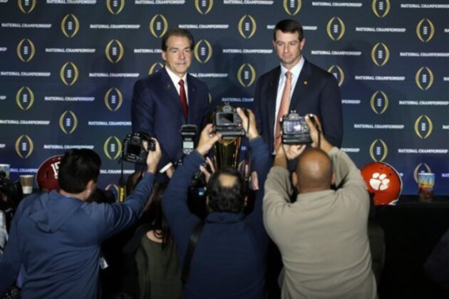 Clemson head coach Dabo Swinney and Alabama head coach Nick Saban pose for a picture during a news conference for the NCAA college football playoff championship game Sunday, Jan. 10, 2016, in Glendale, Ariz. (AP Photo/David J. Phillip) Clemson head coach Dabo Swinney and Alabama head coach Nick Saban pose for a picture during a news conference for the NCAA college football playoff championship game Sunday, Jan. 10, 2016, in Glendale, Ariz. (AP Photo/David J. Phillip)