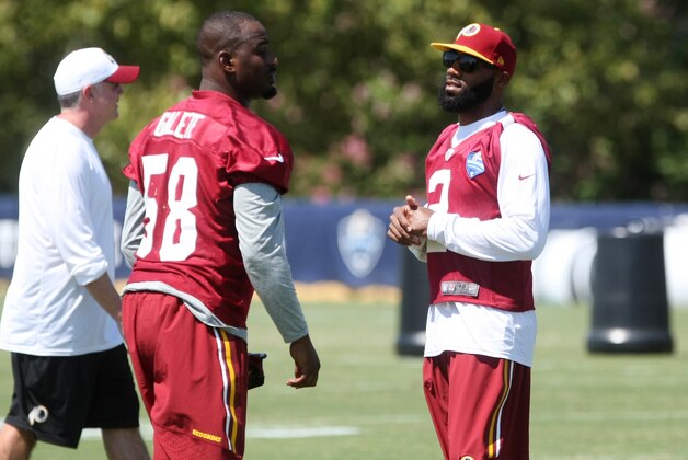 Washington Redskins cornerback DeAngelo Hall, right, talks with teammate Junior Galette during the teams NFL football training camp in Richmond, Va., Saturday, Aug. 1, 2015. (AP Photo/Jason Hirschfeld) Washington Redskins cornerback DeAngelo Hall, right, talks with teammate Junior Galette during the teams NFL football training camp in Richmond, Va., Saturday, Aug. 1, 2015. (AP Photo/Jason Hirschfeld)