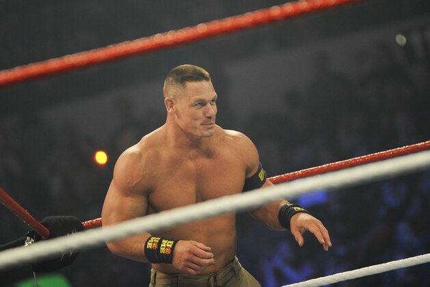 NORFOLK, VA - DECEMBER 09: WWE Superstar John Cena performs during the 10th anniversary of WWE Tribute to the Troops at Norfolk Scope Arena on December 9, 2012 in Norfolk, Virginia. (Photo by Kris Connor/Getty Images for WWE)