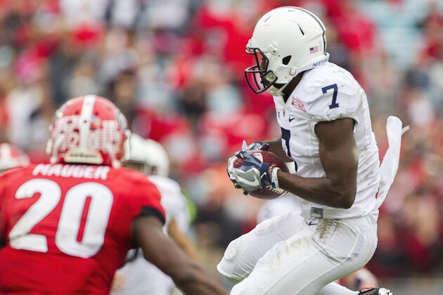Penn State wide receiver Geno Lewis makes a first down catch in front of Georgia's Quincy Mauger in the second half of the TaxSlayer Bowl NCAA college football game in Jacksonville, Fla., Saturday, Jan. 2,  2016. Georgia defeated Penn state 24-17.  (AP Photo/Mark Wallheiser)