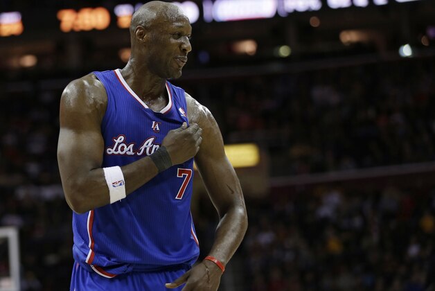 Los Angeles Clippers' Lamar Odom waits during a time-out during an NBA basketball game against the Cleveland Cavaliers Friday, March 1, 2013, in Cleveland. (AP Photo/Tony Dejak)