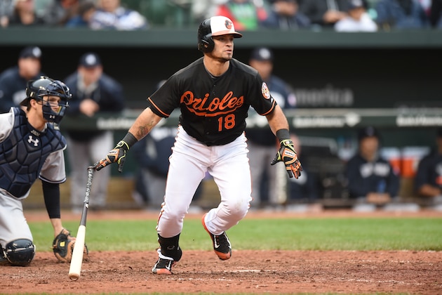 BALTIMORE, MD - OCTOBER 03:  Gerardo Parra #18 of the Baltimore Orioles doubles in the seventh inning to score two runs during game one of a baseball game against the New York Yankees at Oriole Park at Camden Yards on October 3, 2015 in Baltimore, Maryland.  The Orioles won 9-2.  (Photo by Mitchell Layton/Getty Images)
