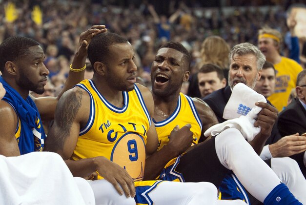 Jan 9, 2016; Sacramento, CA, USA; Golden State Warriors forward Andre Iguodala (9) falls into the Golden State Warriors bench after being fouled on a three point shot during the second quarter of the game against the Sacramento Kings at Sleep Train Arena. Mandatory Credit: Ed Szczepanski-USA TODAY Sports